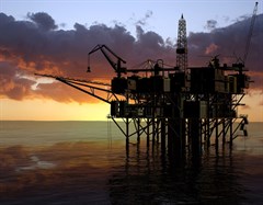 bigstock-Oil-Rig-at-late-evening-17397563